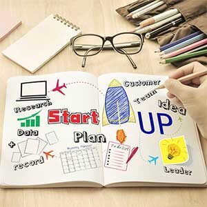 Startup Concept of startup ideas showcased in an open book for a Digital Marketing Course in Lucknow